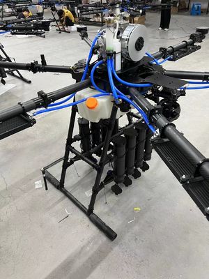 UAV de cuatro ejes con 4 rotores FOC Drive 3090 hélice plegable Atado Drone con bobina de manguera retráctil automática Bobina de cable